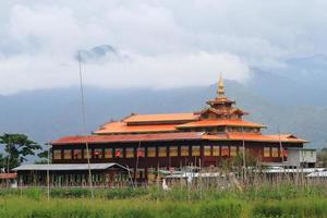 Wooden burmese buddhist monastery on the Inle lake, Myanmar photo