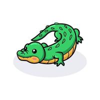 Cute little green crocodile cartoon vector