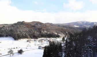 Snow covered houses photo