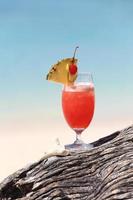 fruit cocktail on a tropical island beach photo