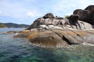 Large stone arch stack at Andaman sea near Koh Lipe, Thailand photo