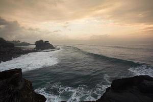 Blue wave at sunset Bali Beach ,Indonesia photo