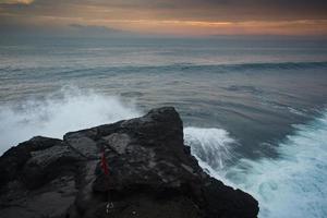 Blue wave at sunset Bali Beach ,Indonesia photo