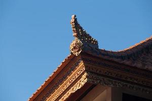 Historic carving at Pura Ulun Danu Bratan Water Temple Bali, Indonesia photo