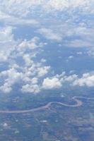 Aerial view of peaceful earth covered in clouds photo