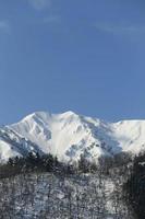 snow covered mountain in Takayama japan photo