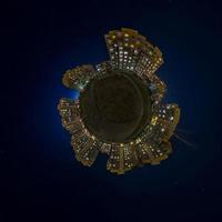 Little planet transformation of spherical panorama 360 degrees. Spherical abstract aerial night view multi-storey buildings. Curvature of space. photo