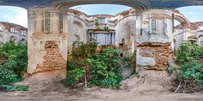 Full spherical seamless hdri panorama 360 degrees angle view inside of concrete structures of abandoned ruined building of church with bushes and trees inside in equirectangular projection, VR content photo