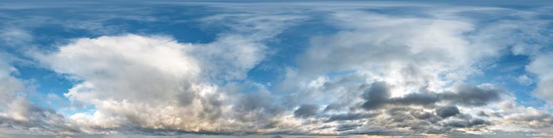 blue sky with beautiful evening cumulus clouds. Seamless hdri panorama 360 degrees angle view with zenith for use in graphics or game development as sky dome or edit drone shot photo