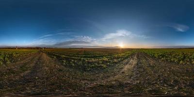 blue sky before sunset with beautiful awesome clouds. full seamless spherical hdri panorama 360 degrees angle view among fields in evening in equirectangular projection, ready for VR AR content photo