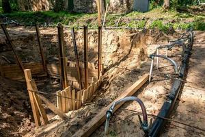 pumping station. groundwater drainage system pumps water out of the ground. dehydration gravel rural route photo