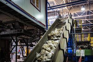 moving conveyor transporter on Modern waste recycling processing plant. Separate and sorting garbage collection. Recycling and storage of waste for further disposal. photo