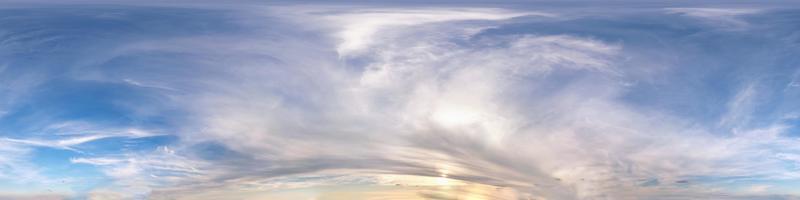 Seamless evening sky before sunset hdri panorama 360 degrees angle view with beautiful clouds  with zenith for use in 3d graphics as sky dome or edit drone shot photo