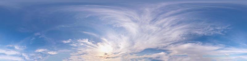 Seamless cloudy blue evening sky hdri panorama 360 degrees angle view before sunset with zenith and beautiful clouds in equirectangular projection for use in 3d graphics as sky dome or edit drone shot photo