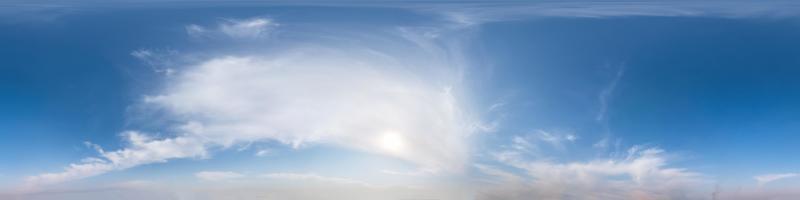 Seamless hdri panorama 360 degrees angle view blue sky with beautiful fluffy cumulus clouds with zenith for use in 3d graphics or game development as sky dome or edit drone shot photo