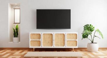 tv encima del armario de madera en una habitación vacía moderna con alfombra de plantas sobre fondo de madera. tema de estilo japonés. arquitectura y concepto interior. representación de ilustración 3d foto