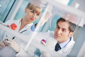 research and  science people  in laboratory photo