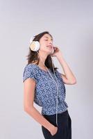 woman with headphones isolated on a white photo