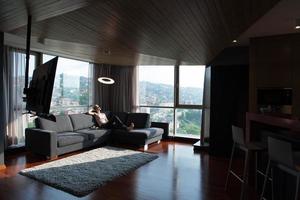 woman using tablet in beautiful apartment photo