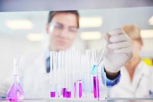 research and  science people  in laboratory photo