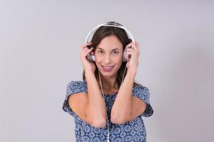 woman with headphones isolated on a white photo