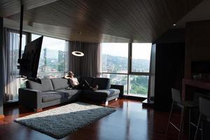 woman using tablet in beautiful apartment photo