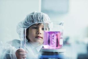 little child scientist in lab photo