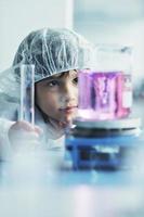 little child scientist in lab photo