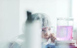 little child scientist in lab photo