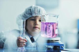 little child scientist in lab photo