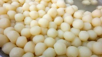 Heap of delicious sweet balls, rasgulla an indian traditional sweet, food concept photo