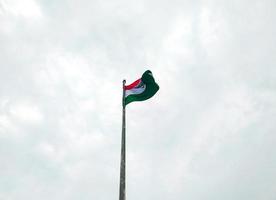 Waving Flag of India in Blue Sky photo