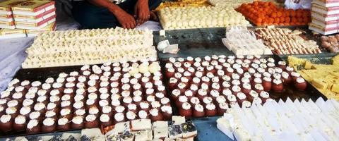 Indian sweets and Mithai in a tray photo