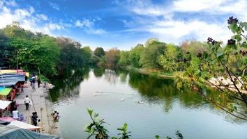 Scenic view of Chandrika Devi Temple with river and greenery photo