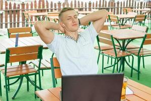 Young man in headphones photo