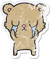 distressed sticker of a crying cartoon bear vector