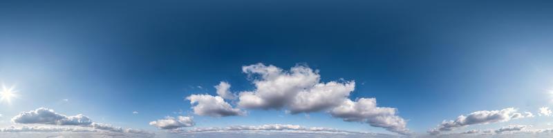 Seamless hdri panorama 360 degrees angle view blue sky with beautiful cumulus clouds with zenith for use in 3d graphics or game development as sky dome or edit drone shot photo