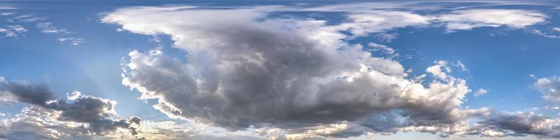 blue sky with beautiful dark clouds before storm. Seamless hdri panorama 360 degrees angle view with zenith for use in 3d graphics or game development as sky dome or edit drone shot photo