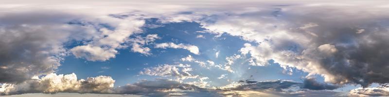 Seamless hdri panorama 360 degrees angle view blue pink evening sky with beautiful clouds before sunset with zenith for use in 3d graphics or game development as sky dome or edit drone shot photo