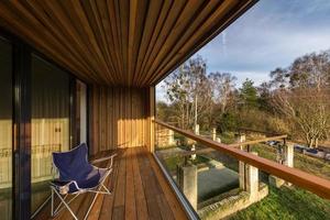 interior of empty hall veranda in wooden village vacation home photo