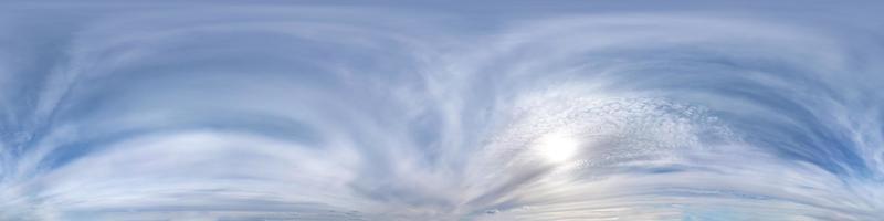 Seamless hdri panorama 360 degrees angle view blue sky with beautiful fluffy cumulus clouds with zenith for use in 3d graphics or game development as sky dome or edit drone shot photo