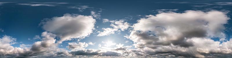 blue sky with beautiful cumulus clouds. Seamless hdri panorama 360 degrees angle view with zenith for use in 3d graphics or game development as sky dome or edit drone shot photo