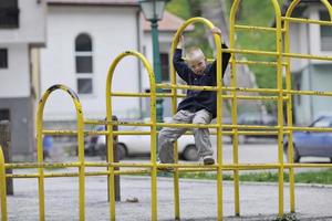 blonde boy in park photo