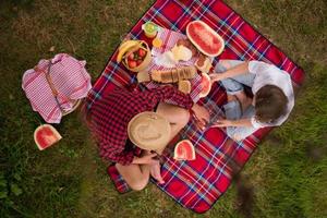 top view of couple enjoying picnic time photo