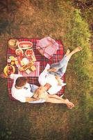 top view of couple enjoying picnic time photo