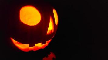 Close-up on a Jack O Lantern glowing in the dark video