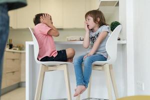 cute little brother and sister at home photo