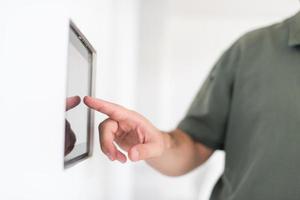 smart home and technology concept close up of male hands photo