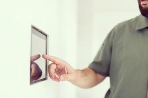 smart home and technology concept close up of male hands photo