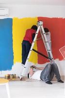 boys painting wall photo